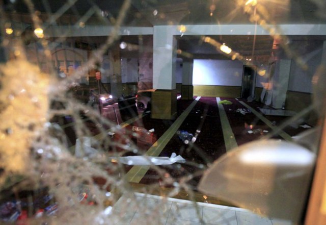 A picture taken on December 25, 2015 shows a devastated Muslim prayer hall in Ajaccio, after protesters vandalized it and tried to set fire to copies of Koran, near a working-class neighbourhood of Ajaccio where two firefighters and one police officer were injured last night during clashes, the French police and prefecture said. / AFP / Pierre-Antoine FOURNIL