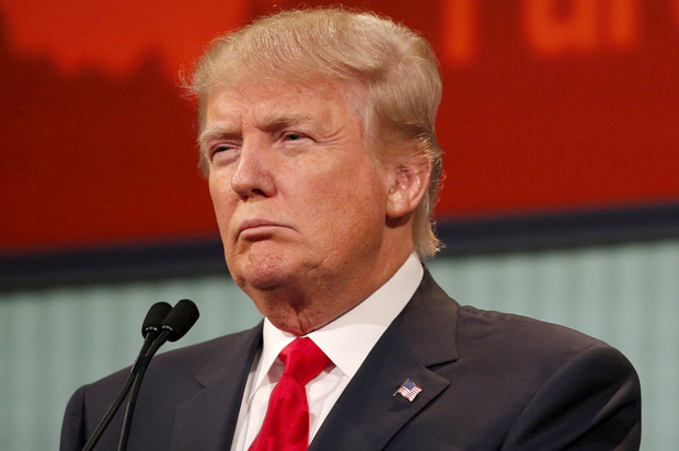 Republican 2016 U.S. presidential candidate businessman Donald Trump listens to a question at the first official Republican presidential candidates debate of the 2016 U.S. presidential campaign in Cleveland, Ohio, August 6, 2015. REUTERS/Brian Snyder  - RTX1NEFT