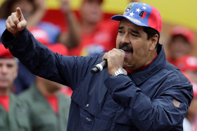 Venezuela's President Nicolas Maduro gestures as he talks to supporters during a rally to commemorate May Day, in Caracas, Venezuela, May 1, 2016. REUTERS/Marco Bello