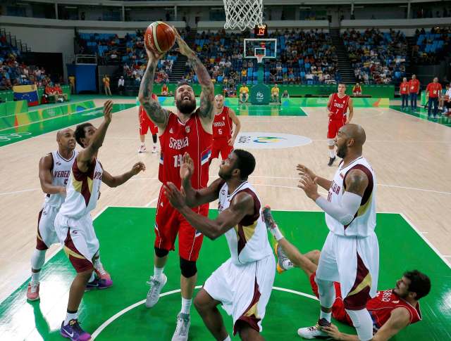 2016 Rio Olympics - Basketball - Preliminary - Men's Preliminary Round Group A Venezuela v Serbia - Carioca Arena 1 - Rio de Janeiro, Brazil - 06/08/2016. Miroslav Raduljica (SRB) of Serbia shoots . REUTERS/Jim Young FOR EDITORIAL USE ONLY. NOT FOR SALE FOR MARKETING OR ADVERTISING CAMPAIGNS.