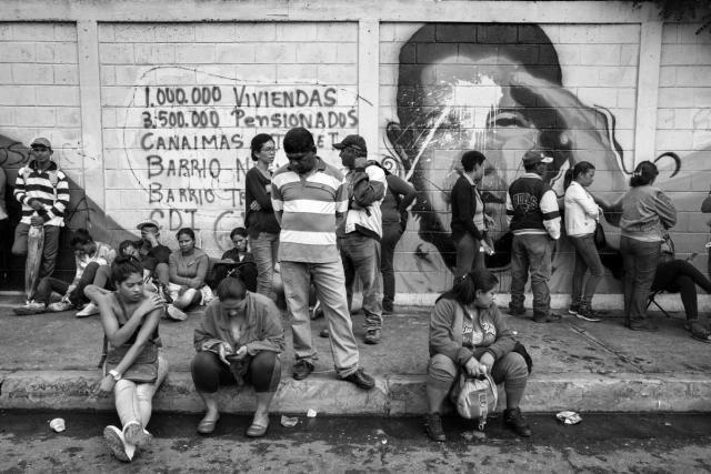 BARQUISIMETO, VENEZUELA - JUNE 2016: A group of civilians queuing to buy food. Shortages in Venezuela is total. The government controls access to commodities. The tension and discontent among the civilian population is increasing and outbreaks of violence and looting are repeated throughout the country. ( Photo by Alvaro Ybarra Zavala / Getty Images Reportage for Time.)