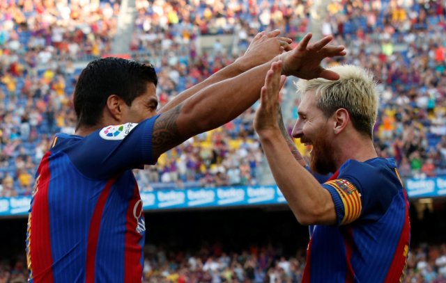 Football Soccer - Barcelona v Real Betis - Spanish La Liga Santander - Camp Nou stadium, Barcelona, Spain - 20/08/16 Barcelona's Luis Suarez and Lionel Messi celebrate a goal against Real Betis. REUTERS/Albert Gea