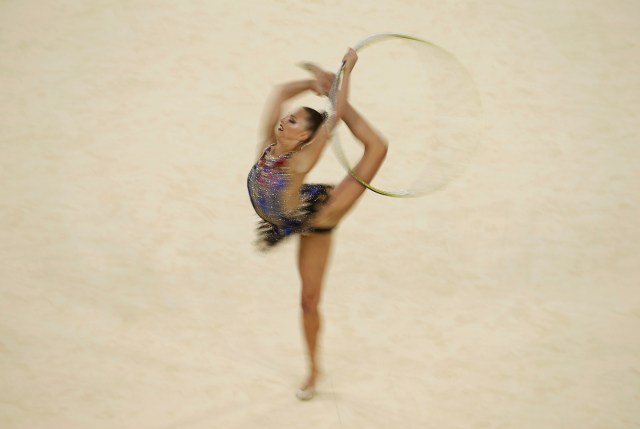 2016 Rio Olympics - Rhythmic Gymnastics - Final - Individual All-Around Final - Rotation 1 - Rio Olympic Arena - Rio de Janeiro, Brazil - 20/08/2016. Melitina Staniouta (BLR) of Belarus competes using the hoop. REUTERS/Matthew Childs FOR EDITORIAL USE ONLY. NOT FOR SALE FOR MARKETING OR ADVERTISING CAMPAIGNS.