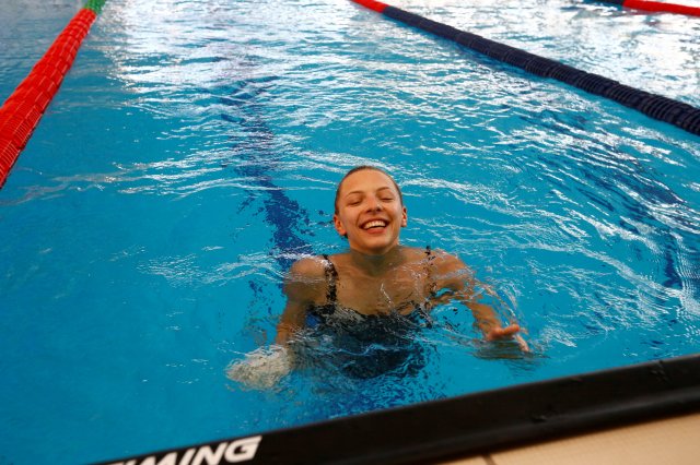 Belarussian rhythmic gymnast Melitina Staniouta swims at a sports base as she prepares for the 2016 Rio Olympics in Minsk, June 9, 2016. Picture taken June 9, 2016. REUTERS/Vasily Fedosenko SEARCH "BELARUS OLYMPIC" FOR THIS STORY. SEARCH "THE WIDER IMAGE" FOR ALL STORIES.