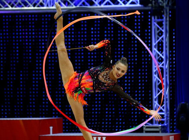 Belarussian rhythmic gymnast Melitina Staniouta performs during BSB Bank World Cup 2016 in Minsk, May 21, 2016. Picture taken May 21, 2016. REUTERS/Vasily Fedosenko SEARCH "BELARUS OLYMPIC" FOR THIS STORY. SEARCH "THE WIDER IMAGE" FOR ALL STORIES.