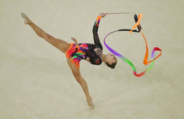 2016 Rio Olympics - Rhythmic Gymnastics - Final - Individual All-Around Final - Rotation 4 - Rio Olympic Arena - Rio de Janeiro, Brazil - 20/08/2016. Melitina Staniouta (BLR) of Belarus competes using the ribbon. REUTERS/Ruben Sprich  FOR EDITORIAL USE ONLY. NOT FOR SALE FOR MARKETING OR ADVERTISING CAMPAIGNS.