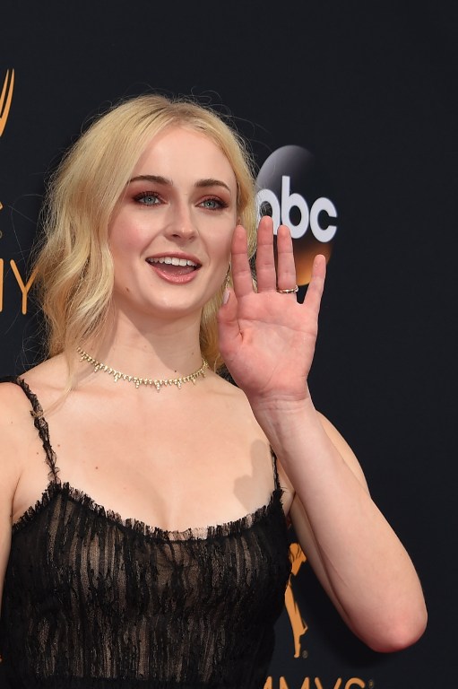 Actress of the serie "Games of Thrones" Sophie Turner arrives for the 68th Emmy Awards on September 18, 2016 at the Microsoft Theatre in Los Angeles.  / AFP PHOTO / Robyn Beck