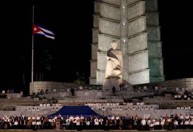 The Cuban flag flies at half-mast as dignitaries gather for a massive tribute to Cuba's late President Fidel Castro in Revolution Square in Havana, Cuba, November 29, 2016. REUTERS/Stringer EDITORIAL USE ONLY. NO RESALES. NO ARCHIVE