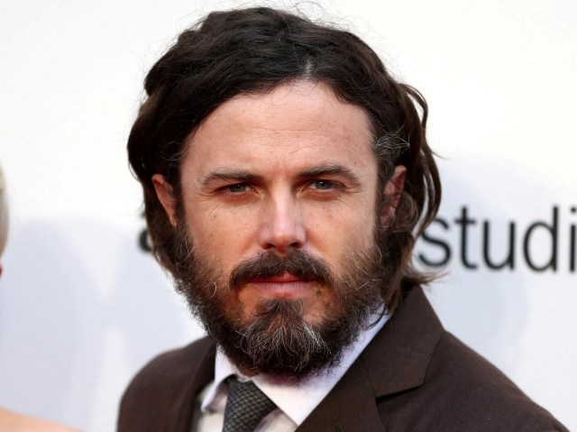 FILE PHOTO: Actor Casey Affleck poses for a photograph at a Gala screening of their film "Manchester by the Sea" at the 60th BFI London Film Festival in London, Britain October 8, 2016. REUTERS/Neil Hall/File Photo