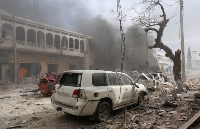 Destroyed cars are seen near the scene of an explosion in front of Dayah hotel in Somalia's capital Mogadishu, January 25, 2017. REUTERS/Feisal Omar