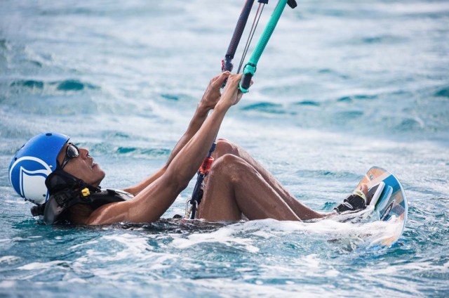 Former U.S. President Barack Obama tries his hand at kite surfing during a holiday with British businessman Richard Branson on his island Moskito, in the British Virgin Islands, in a picture handed out by Virgin on February 7, 2017. Jack Brockway/Virgin Handout via REUTERS FOR EDITORIAL USE ONLY