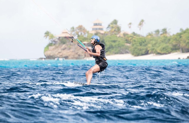 Former U.S. President Barack Obama tries his hand at kite surfing during a holiday with British businessman Richard Branson on his island Moskito, in the British Virgin Islands, in a picture handed out by Virgin on February 7, 2017. Jack Brockway/Virgin Handout via REUTERS FOR EDITORIAL USE ONLY