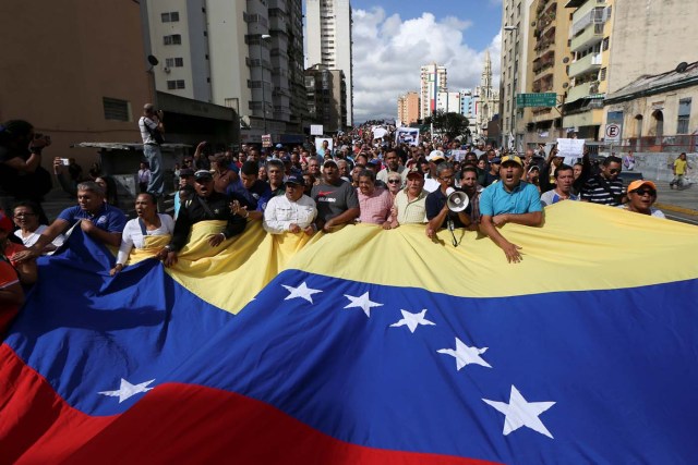 Workers of the health sector and opposition supporters take part in a rally due to the shortages of basic medical supplies and against Venezuelan President Nicolas Maduro's government in Caracas, Venezuela February 7, 2017. REUTERS/Carlos Garcia Rawlins