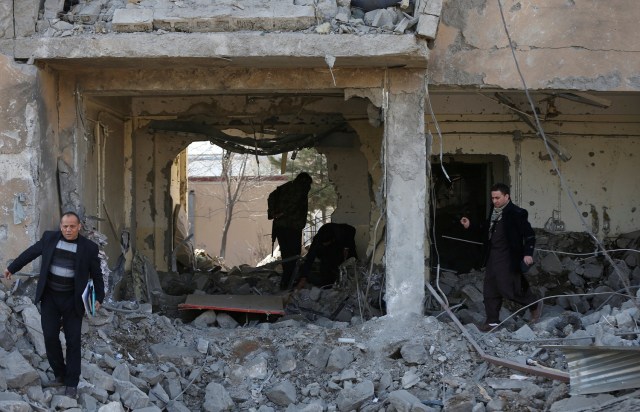 Members of police investigation department inspect the site of yesterday's blast in Kabul, Afghanistan March 2, 2017. REUTERS/Omar Sobhani