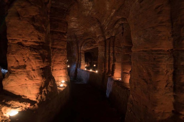 Photo © 2017 Michael Scott/Caters News/The Grosby Group - It might look like an ordinary rabbits hole, but this tunnel unearths a stunning CAVE. The unassuming hole reveals a cave which is hidden less than a metre beneath a farmers field. The untouched caves, in Shropshire, date back 700 years when they were used by the Knights Templars - a medieval religious order that fought in the Crusades. Photographer Michael Scott, from Birmingham, set out in search of the historical wonder after seeing a video of it online.