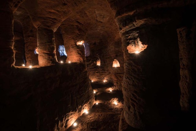 Photo © 2017 Michael Scott/Caters News/The Grosby Group - It might look like an ordinary rabbits hole, but this tunnel unearths a stunning CAVE. The unassuming hole reveals a cave which is hidden less than a metre beneath a farmers field. The untouched caves, in Shropshire, date back 700 years when they were used by the Knights Templars - a medieval religious order that fought in the Crusades. Photographer Michael Scott, from Birmingham, set out in search of the historical wonder after seeing a video of it online.