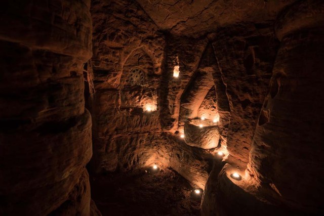 Photo © 2017 Michael Scott/Caters News/The Grosby Group - It might look like an ordinary rabbits hole, but this tunnel unearths a stunning CAVE. The unassuming hole reveals a cave which is hidden less than a metre beneath a farmers field. The untouched caves, in Shropshire, date back 700 years when they were used by the Knights Templars - a medieval religious order that fought in the Crusades. Photographer Michael Scott, from Birmingham, set out in search of the historical wonder after seeing a video of it online.