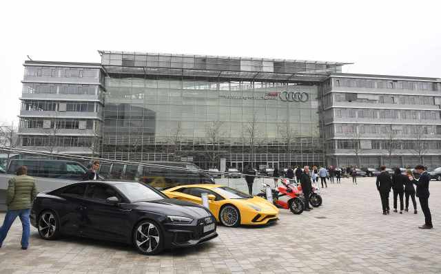 Audi cars are parked in front of the company's headquarters in Ingolstadt, Germany, March 15, 2017. REUTERS/Lukas Barth