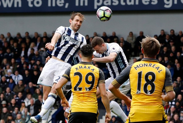 Britain Football Soccer - West Bromwich Albion v Arsenal - Premier League - The Hawthorns - 18/3/17 West Bromwich Albion's Craig Dawson scores their third goal Reuters / Darren Staples Livepic EDITORIAL USE ONLY. No use with unauthorized audio, video, data, fixture lists, club/league logos or "live" services. Online in-match use limited to 45 images, no video emulation. No use in betting, games or single club/league/player publications. Please contact your account representative for further details.