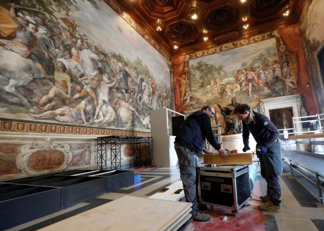 Workers prepare the Orazi and Curiazi hall for the meeting of EU leaders on the 60th anniversary of the Treaty of Rome, in Rome, Italy March 24, 2017. REUTERS/Remo Casilli