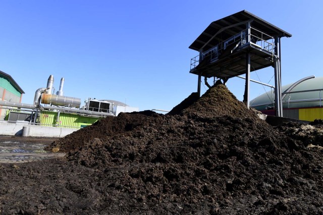 TO GO WITH AFP STORY BY CELINE CORNU A picture shows cows excrements recycled by the Shit Museum (Museum of Poop) to produce methane and energy or "Merdacotta" (baked shit) on march 28, 2017 at the Castelbosco castle of Gragnano Trebbiense. The idea of the Shit Museum founded in 2015 by Italian Gianantonio Locatelli, came from a farm which makes milk for Grana Padano cheese with 3,500 cows producing around 50,000 litres of milk and 150,000 kilos of dung to be recycled. Under Locatelli?s management, this quantity of feces started to be transformed into a futuristic ecological, productive and cultural project. Using innovative systems, electrical energy started to be produced from the manure but also green fertilizer and objects made from "Merdacotta".  / AFP PHOTO / Miguel MEDINA