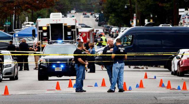 Oficiales de policía y agentes del FBI trabajan en la escena de un tiroteo. FOTO: EFE/ARCHIVO