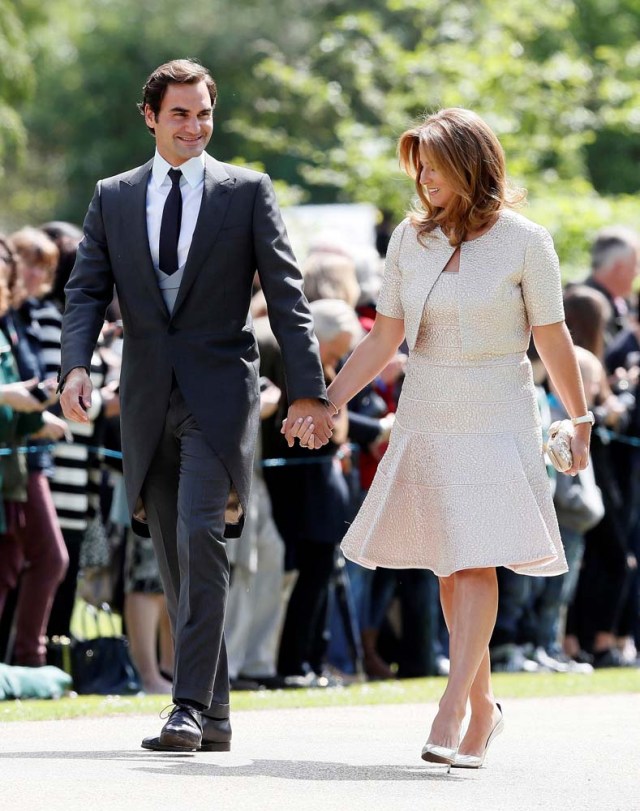 Swiss tennis player Roger Federer and his wife Mirka attend the wedding of Pippa Middleton, the sister of Britain's Catherine, Duchess of Cambridge, and James Matthews at St Mark's Church in Englefield, west of London, on May 20, 2017. REUTERS/Kirsty Wigglesworth/Pool