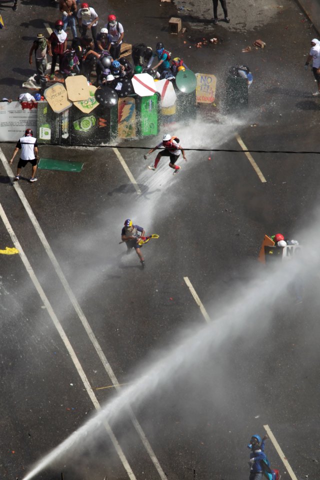 La fuerte represión de la GN contra la Marcha de Los Libertadores. REUTERS/Christian Veron