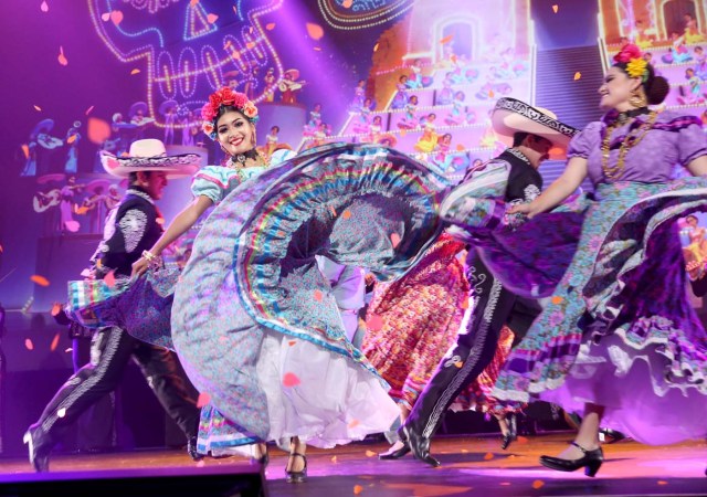 ANAHEIM, CA - JULY 14: Dancers perform the song 'Remember Me' from COCO onstage during the Walt Disney Studios animation presentation at Disney's D23 EXPO 2017 in Anaheim, Calif. COCO will be released in U.S. theaters on November 22, 2017. Jesse Grant/Getty Images for Disney/AFP