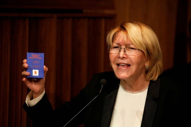 Venezuela's chief prosecutor Luisa Ortega Diaz holds a constitution of Venezuela during a news conference in Caracas, Venezuela, July 4, 2017. REUTERS/Carlos Garcia Rawlins TPX IMAGES OF THE DAY