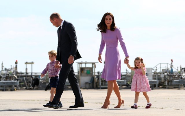 Britain's Prince William, the Duke of Cambridge, his wife Princess Catherine, the Duchess of Cambridge, Prince George and Princess Charlotte walk at the airfield in Hamburg Finkenwerder, Germany, July 21, 2017.    REUTERS/Christian Charisius/Pool