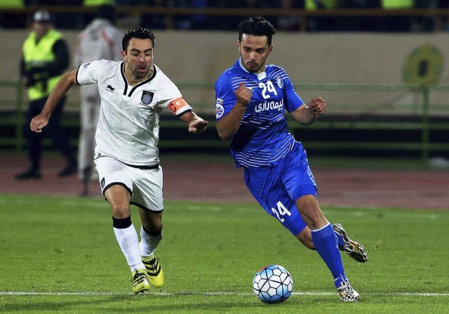 El futbolista español, Xavi Hernandez (izq). EFE/EPA/STRINGER