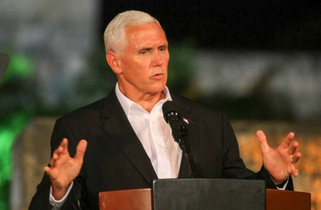 US Vice President Mike Pence speaks during a joint press conference with Colombian President Juan Manuel Santos (not in frame) at the Presidential guest house in Cartagena, Colombia on August 13, 2017.  Pence launches a Latin America tour that has taken on new significance following President Donald Trump's threat of a possible "military option" against Venezuela. The weeklong trip, aimed at coordinating a regional diplomatic action to the political crisis in Caracas, begins in Colombia and also includes Argentina, Chile and Panama. / AFP PHOTO / STR