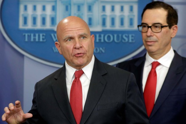 U.S. Treasury Secretary Steve Mnuchin (R) listens to National Security Adviser Lt. Gen. H.R. McMaster speak during a briefing at the White House in Washington, U.S., to announce sanctions against Venezuela, August 25, 2017. REUTERS/Yuri Gripas