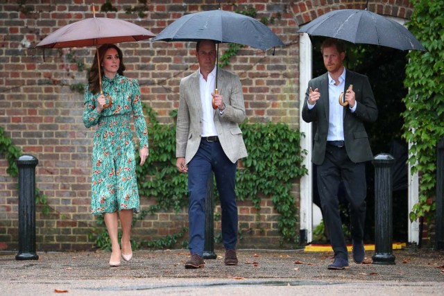 Britain's Catherine Duchess of Cambridge, Prince William and Prince Harry arrive for a visit to the White Garden in Kensington Palace in London, Britain August 30, 2017. REUTERS/Hannah McKay