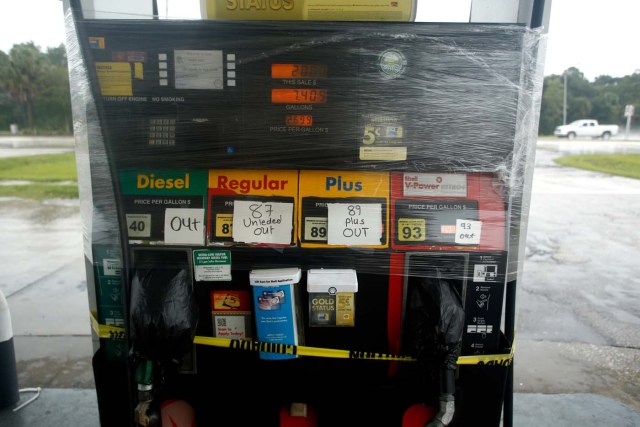 TAMPA, FL - SEPTEMBER 10: The few motorists remaining on the roads pass empty fuel pumps at a closed gas station ahead of Hurricane Irma on September 10, 2017 in Tampa, Florida. Hurricane Irma made landfall in the Florida Keys as a Category 4 storm on Sunday, lashing the state with 130 mph winds as it moves up the coast.   Brian Blanco/Getty Images/AFP