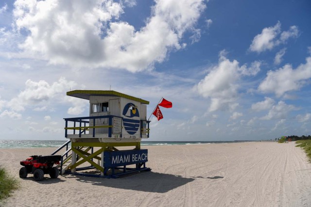 Lifeguards in beach patrol tower keep watch along a stretch of the beach in Miami Beach, Florida, U.S., September 8, 2017. REUTERS/Bryan Woolston