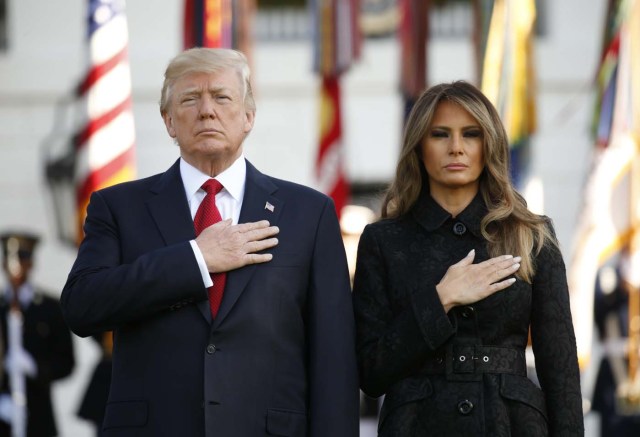 U.S. President Donald Trump and first lady Melania Trump lead a moment of silence to mark the 16th anniversary of the September 11 attacks at the White House in Washington, U.S., September 11, 2017. REUTERS/Kevin Lamarque