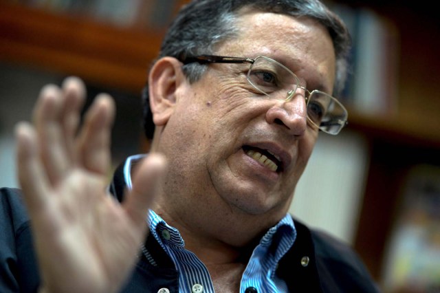 Juan Jose Avila, president of the Venezuelan Professional Baseball League, speaks to AFP during an interview in Caracas on September 12, 2017. While baseball is Venezuela's national sport, some fans are angry that the government, given the severity of the economic crisis and the political tension, will spend nearly ten million dollars on organizing the upcoming Winter League rather than on imports of food and medicine. / AFP PHOTO / FEDERICO PARRA