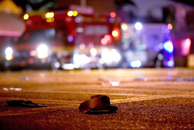 LAS VEGAS, NV - OCTOBER 02: A cowboy hat lays in the street after shots were fired near a country music festival on October 1, 2017 in Las Vegas, Nevada. A gunman has opened fire on a music festival in Las Vegas, leaving at least 20 people dead and more than 100 injured. Police have confirmed that one suspect has been shot. The investigation is ongoing.   David Becker/Getty Images/AFP