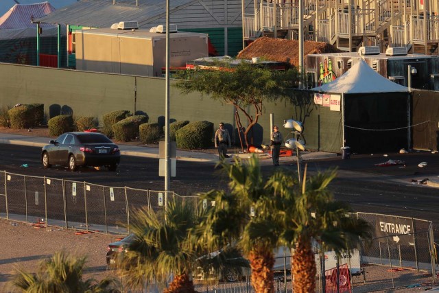 Police patrol the crime scene following the mass shooing at the Route 91 Harvest Country Music Festival on the Las Vegas Strip in Las Vegas, Nevada, U.S., October 3, 2017. REUTERS/Mike Blake