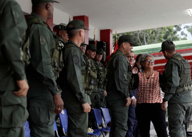 Venezuela's National Electoral Council (CNE) President Tibisay Lucena talks with Admiral-in-Chief Remigio Ceballos, Strategic Operational Commander of the Bolivarian National Armed Forces and Venezuela's Defense Minister Vladimir Padrino Lopez during a ceremony ahead of the regional elections which will be held on October 15, in Caracas, Venezuela, October 9, 2017. REUTERS/Ricardo Moraes