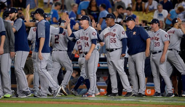 Oct 25, 2017; Los Angeles, CA, USA; Houston Astros manager A.J. Hinch (14) celebrates with his team after defeating the Los Angeles Dodgers in game two of the 2017 World Series at Dodger Stadium. Mandatory Credit: Gary A. Vasquez-USA TODAY Sports