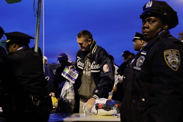 New York Police Department officers take part in security screening before the start of the New York City Marathon in New York, U.S., November 5, 2017.  REUTERS/Lucas Jackson