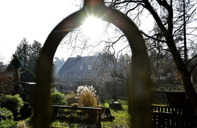 A house is pictured in Alwine, a splinter settlement of the town Uebigau-Wahrenbrueck, eastern Germany, on November 30, 2017. On December 9, 2017, Alwine's dozen buildings, plus sheds and garages, are to go under the hammer at an auction in Berlin, with a starting price of 125,000 euros ($148,000). / AFP PHOTO / Tobias Schwarz