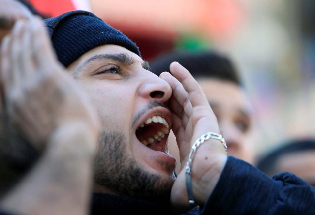 A demonstrator shouts slogans during a protest as Palestinians call for a "day of rage" in response to U.S. President Donald Trump's recognition of Jerusalem as Israel's capital, in the West Bank city of Nablus, December 8, 2017. REUTERS/Abed Omar Qusini