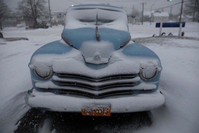 A car is seen covered in snow in Long Beach, New York, U.S. January 4, 2018. REUTERS/Shannon Stapleton