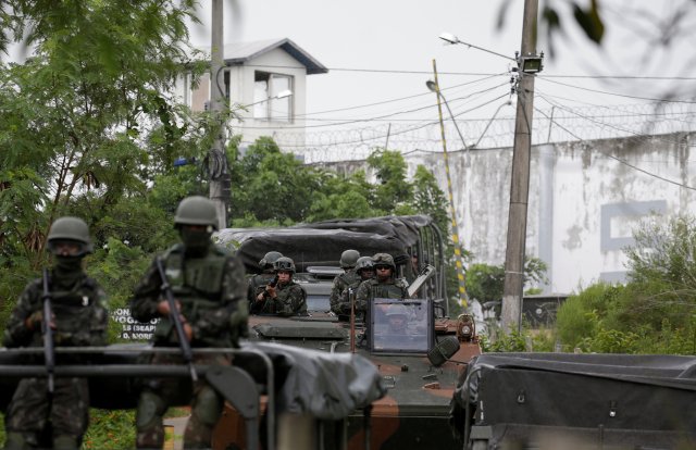 Armed forces members leave the Milton Dias Moreira penitentiary after an inspection operation in Japeri, near Rio de Janeiro, Brazil February 21, 2018. REUTERS/Ricardo Moraes