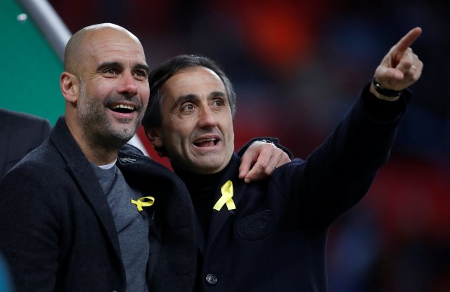 Soccer Football - Carabao Cup Final - Arsenal vs Manchester City - Wembley Stadium, London, Britain - February 25, 2018   Manchester City manager Pep Guardiola celebrates after winning the Carabao Cup   Action Images via Reuters/Carl Recine     EDITORIAL USE ONLY. No use with unauthorized audio, video, data, fixture lists, club/league logos or "live" services. Online in-match use limited to 75 images, no video emulation. No use in betting, games or single club/league/player publications. Please contact your account representative for further details.