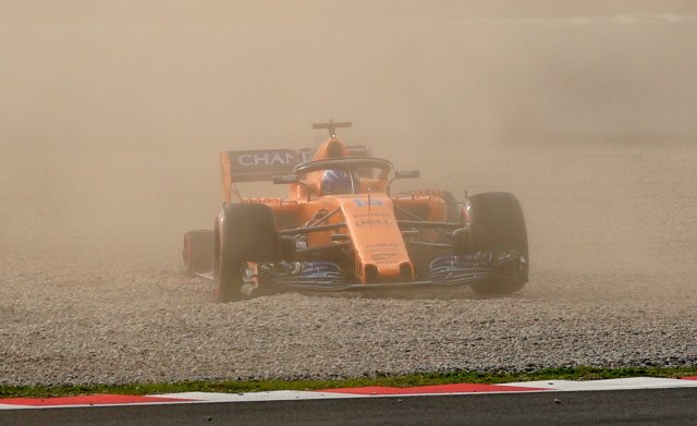 F1 Formula One - Formula One Test Session - Circuit de Barcelona Catalunya, Montmelo, Spain - February 26, 2018 Fernando Alonso of McLaren crashes out after losing a rear tyre during testing REUTERS/Albert Gea